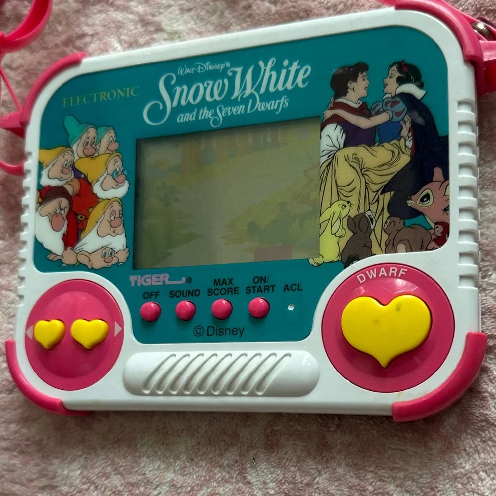 Vintage 1990 Tiger Electronics Snow White Handheld Game with purse strap